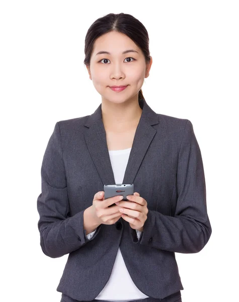 Businesswoman with cellphone — Stock Photo, Image