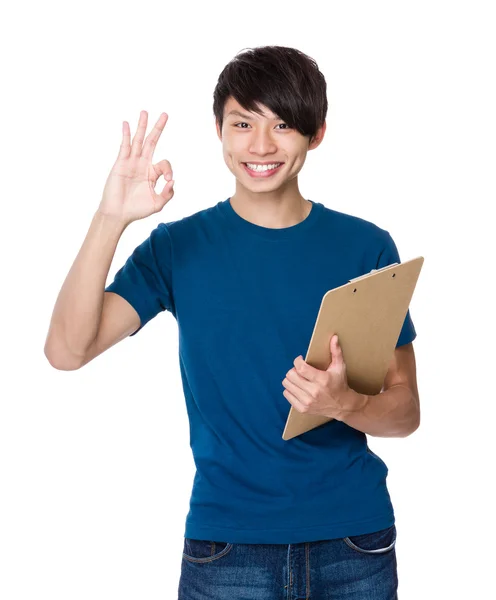 Man with clipboard and ok sign — Stock Photo, Image