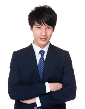 Kolları çapraz iş adamı