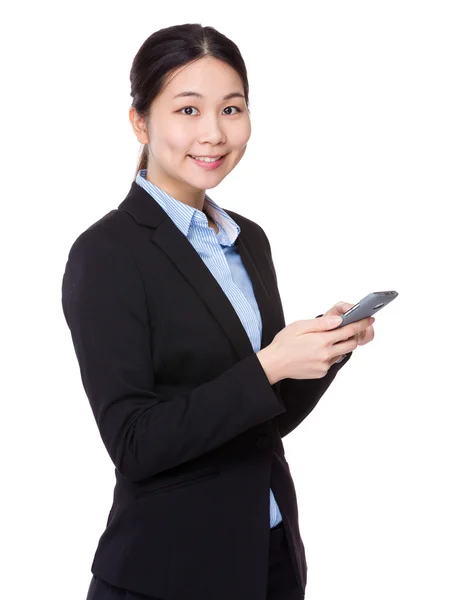 Businesswoman using mobile phone — Stock Photo, Image