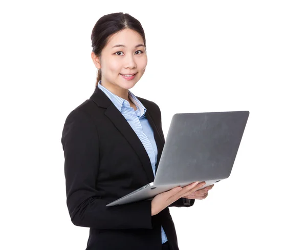 Businesswoman using laptop — Stock Photo, Image