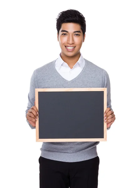 Businessman with chalkboard — Stock Photo, Image