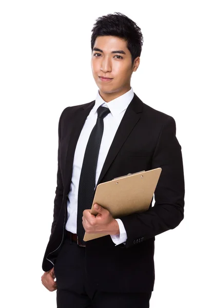 Businessman with clipboard — Stock Photo, Image