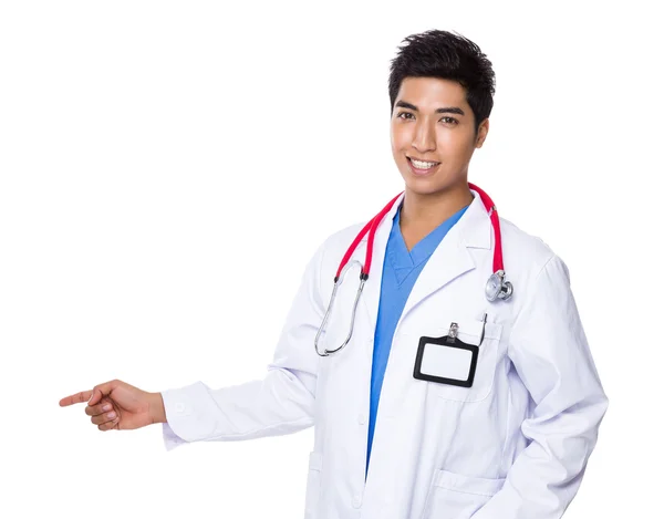 Doctor with finger point aside — Stock Photo, Image