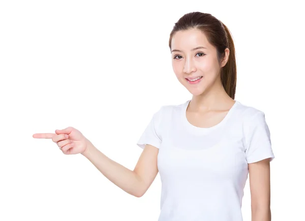 Woman with finger point aside — Stock Photo, Image