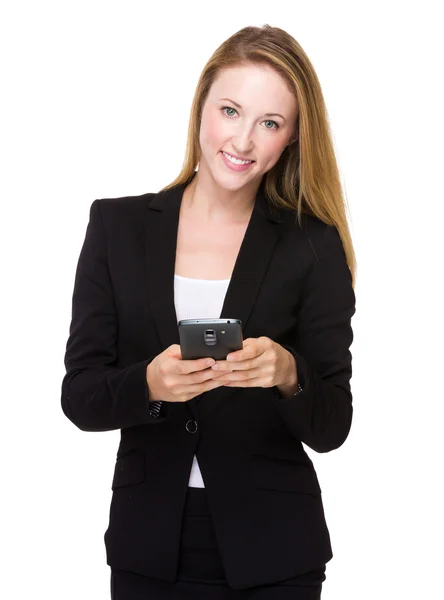 Businesswoman with mobile phone — Stock Photo, Image