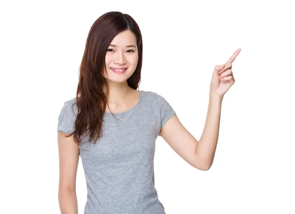 Woman with finger pointing up — Stock Photo, Image