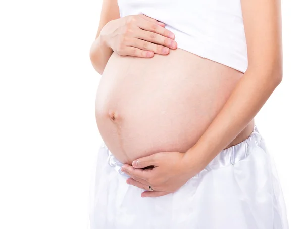 Mulher grávida tocando sua barriga — Fotografia de Stock