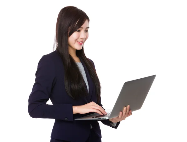 Asian businesswoman in business suit — Stock Photo, Image