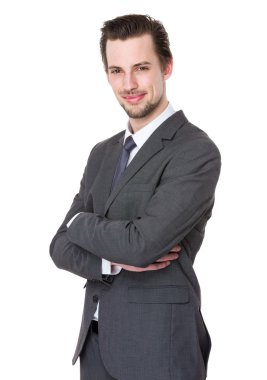 Gri takım elbiseli beyaz iş adamı