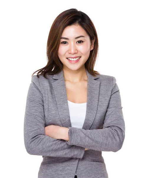 Азиатская бизнесвумен в сером костюме — стоковое фото