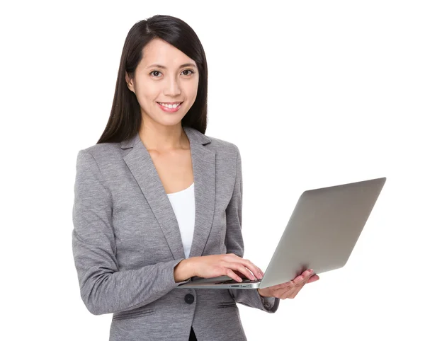 Asian businesswoman in gray suit — Stock Photo, Image