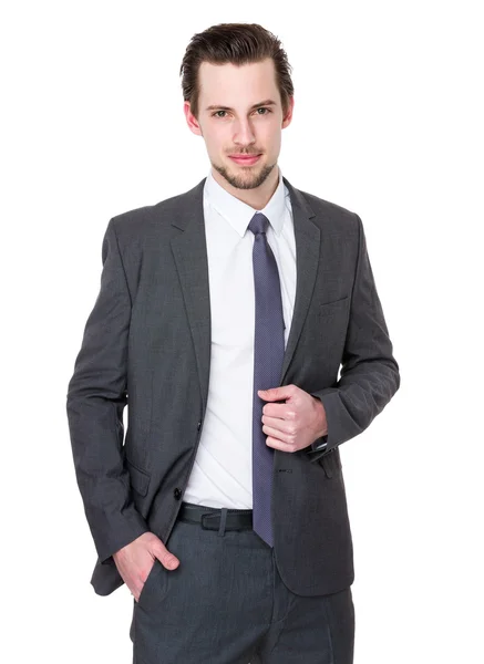 Caucasian businessman in gray suit — Stock Photo, Image