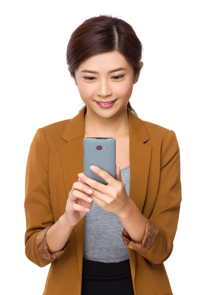 Asian businesswoman in brown jacket — Stock Photo, Image