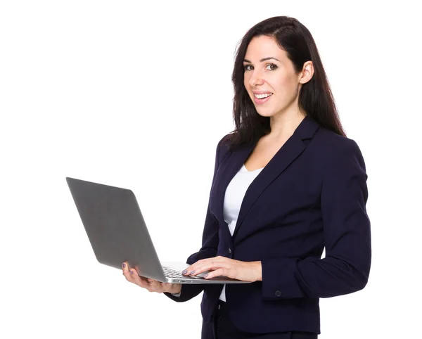 Caucasian businesswoman in black suit — Stock Photo, Image