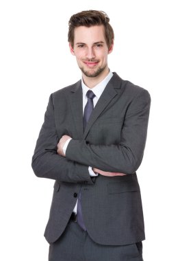 Gri takım elbiseli beyaz iş adamı