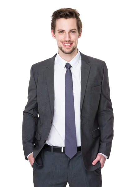 Hombre de negocios caucásico en traje gris — Foto de Stock