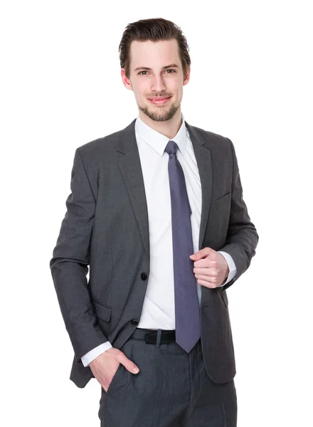 Homem de negócios caucasiano em terno cinza — Fotografia de Stock