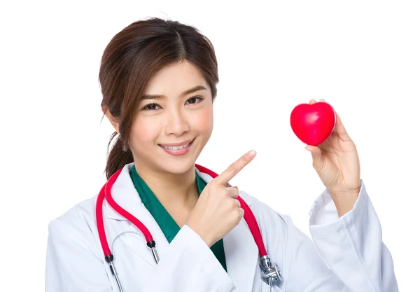 Doctor point to heart ball — Stock Photo, Image