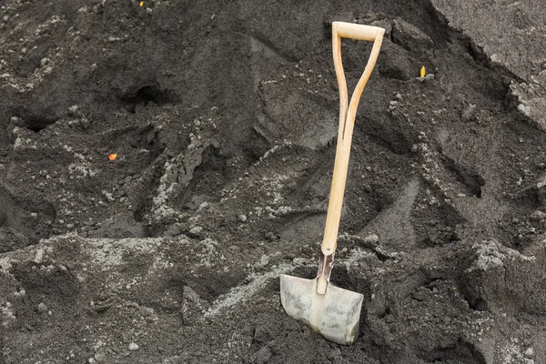 Spade och sand — Stockfoto