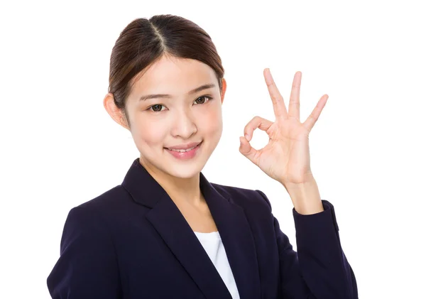 Businesswoman showing okay sign — Stock Photo, Image