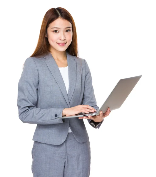 Asian businesswoman in business suit — Stock Photo, Image