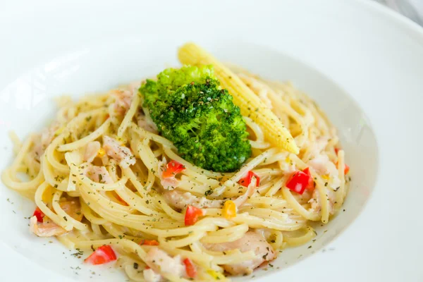 Spaghetti on white dish — Stock Photo, Image