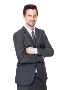 İş takım elbiseli yakışıklı işadamı