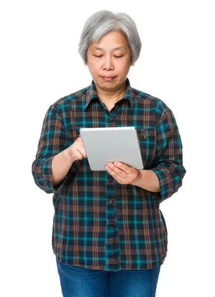 Asian mature woman in plaid shirt — Stock Photo, Image