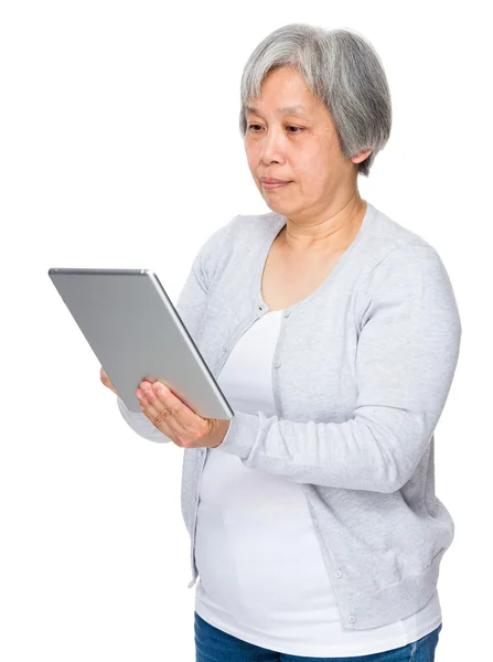 Asian mature woman in gray cardigan — Stock Photo, Image