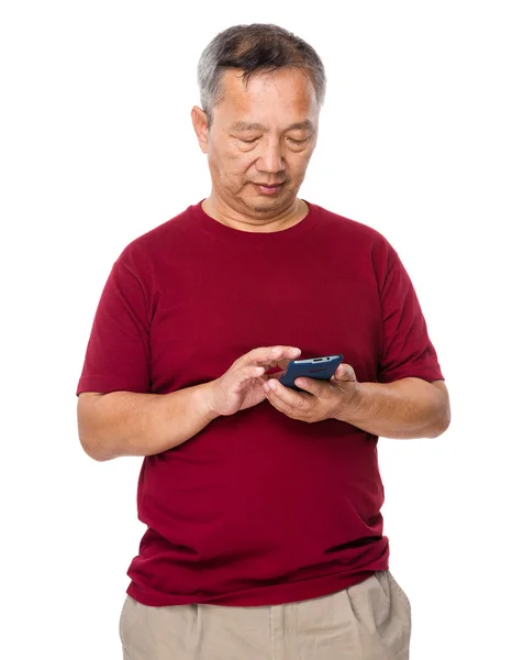 Old Asian man in red t-shirt — Stock Photo, Image