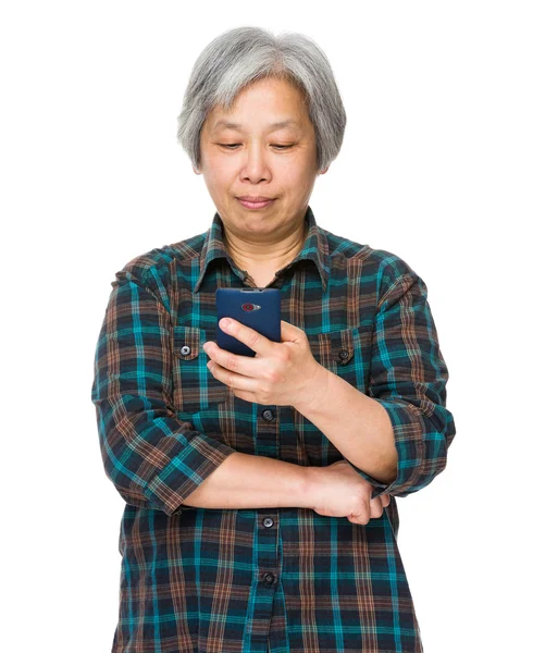 Asian mature woman in checkered shirt — Stock Photo, Image