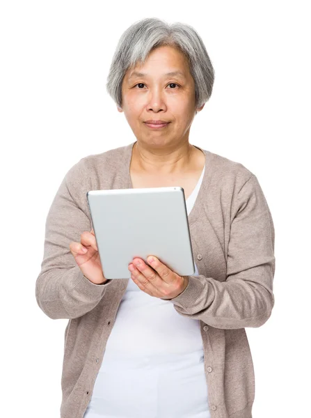 Asian mature woman in beige cardigan — Stock Photo, Image