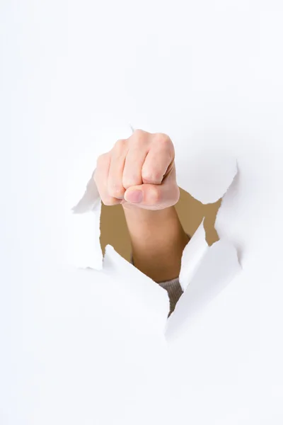 Fist punching paper — Stock Photo, Image