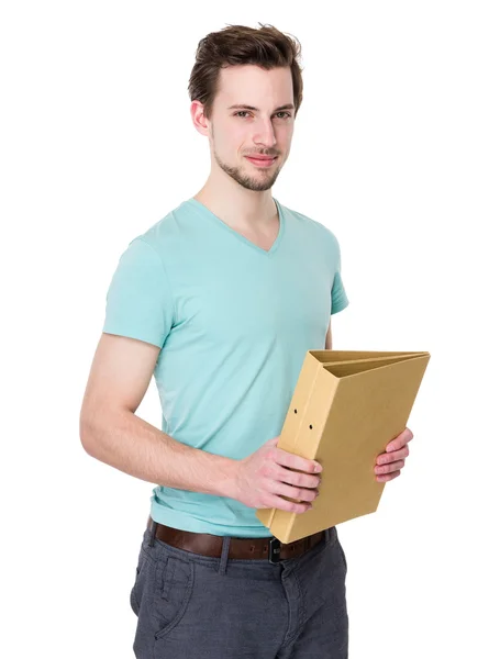 Kaukasische knappe man in turquoise t shirt — Stockfoto