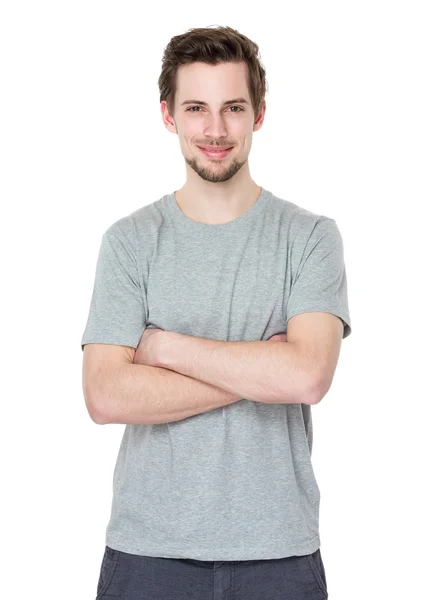 Uomo bello caucasico in t shirt grigia — Foto Stock