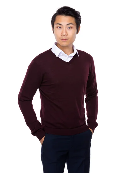 Asian young businessman in red sweater — Stock Photo, Image