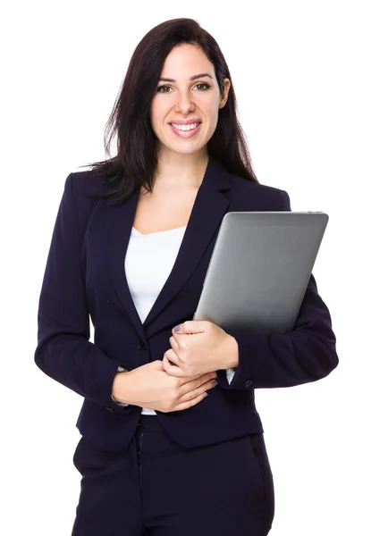 Kaukasische jonge zakenvrouw in blauwe pak — Stockfoto