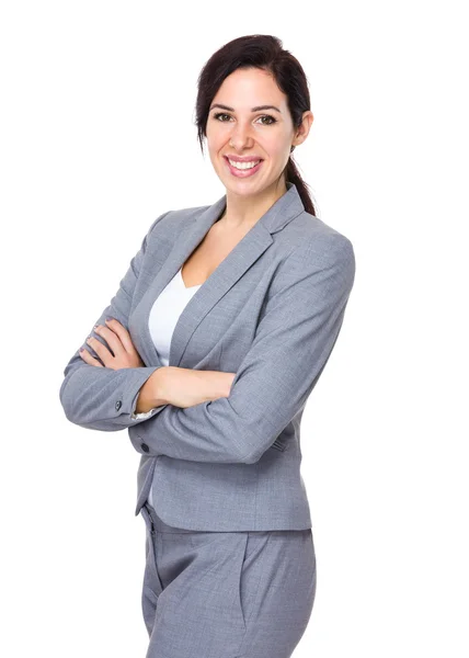 Caucasian young businesswoman in grey suit — Stock Photo, Image