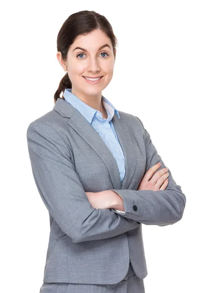 Kaukasische junge Geschäftsfrau im grauen Anzug — Stockfoto