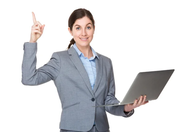 Caucasian young businesswoman in grey suit — Stock Photo, Image