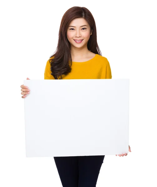 Asian young woman in yellow sweater — Stock Photo, Image