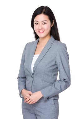 Asya genç iş kadını gri takım elbise