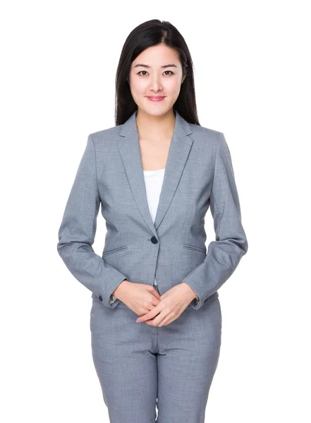 Ázsiai fiatal üzletasszony, szürke színben — Stock Fotó