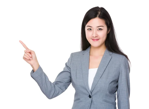 Asian young businesswoman in grey suit — Stock Photo, Image