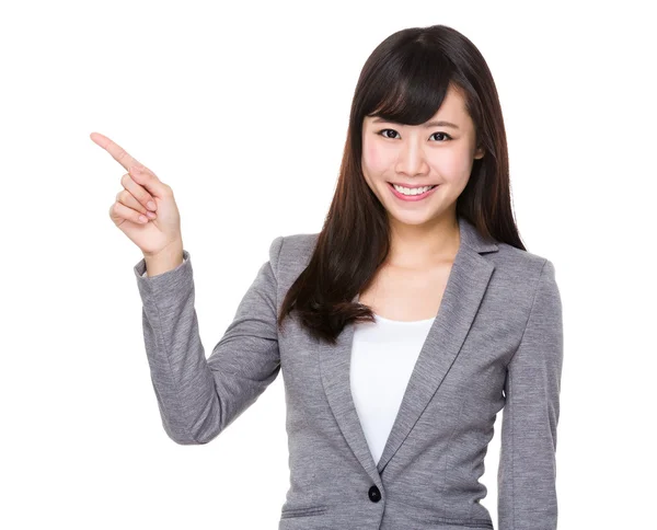 Businesswoman with finger pointing up — Stock Photo, Image