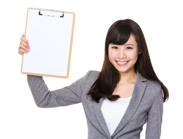 Young businesswoman show with clipboard — Stock Photo, Image