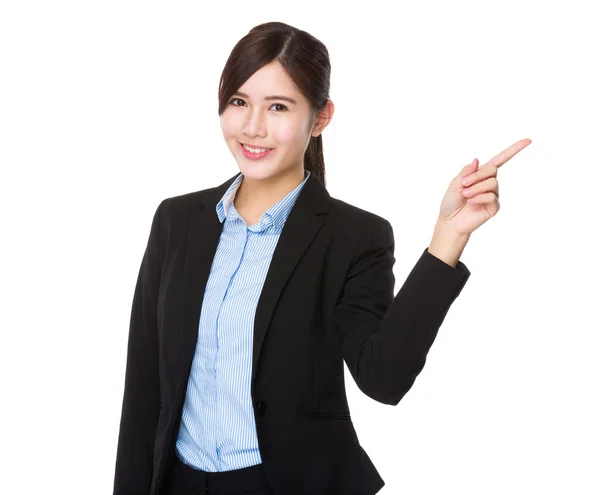 Young businesswoman with finger showing up — Stock Photo, Image