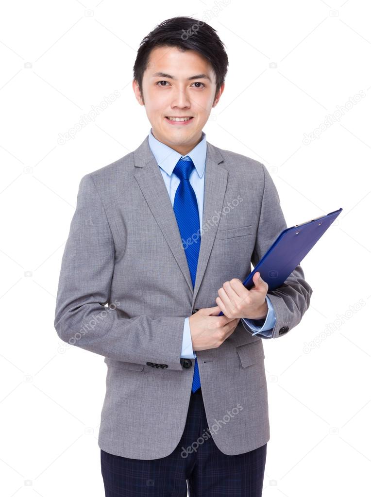 Asian handsome businessman in grey suit