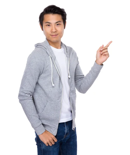 Asian young man in grey jacket — Stock Photo, Image